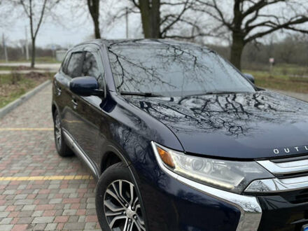 Синій Міцубісі Аутлендер, об'ємом двигуна 2.36 л та пробігом 144 тис. км за 16700 $, фото 1 на Automoto.ua