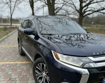 Синій Міцубісі Аутлендер, об'ємом двигуна 2.36 л та пробігом 144 тис. км за 16700 $, фото 1 на Automoto.ua