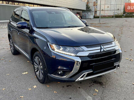Синий Мицубиси Аутлендер, объемом двигателя 2.36 л и пробегом 71 тыс. км за 13800 $, фото 1 на Automoto.ua