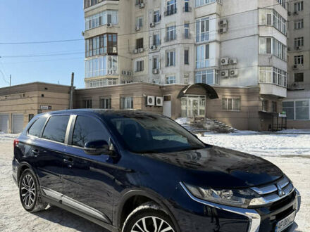 Синий Мицубиси Аутлендер, объемом двигателя 2.36 л и пробегом 96 тыс. км за 17700 $, фото 1 на Automoto.ua