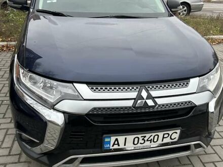 Синій Міцубісі Аутлендер, об'ємом двигуна 2.36 л та пробігом 129 тис. км за 16500 $, фото 1 на Automoto.ua