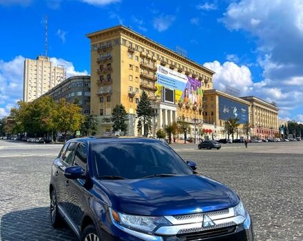 Синій Міцубісі Аутлендер, об'ємом двигуна 2.4 л та пробігом 129 тис. км за 16600 $, фото 1 на Automoto.ua