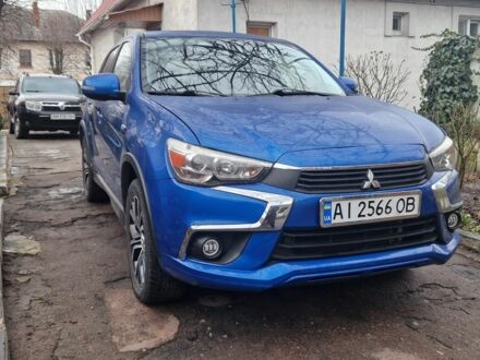 Синий Мицубиси Аутлендер, объемом двигателя 2 л и пробегом 87 тыс. км за 15800 $, фото 1 на Automoto.ua