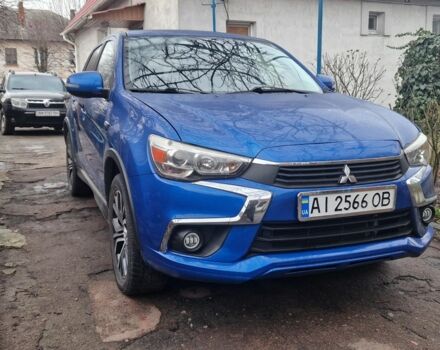 Синий Мицубиси Аутлендер, объемом двигателя 2 л и пробегом 87 тыс. км за 15800 $, фото 1 на Automoto.ua