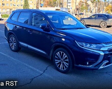 Синий Мицубиси Аутлендер, объемом двигателя 2.4 л и пробегом 67 тыс. км за 24000 $, фото 1 на Automoto.ua