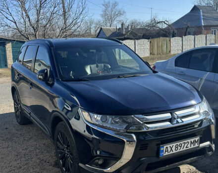 Синій Міцубісі Аутлендер, об'ємом двигуна 2.4 л та пробігом 161 тис. км за 17500 $, фото 1 на Automoto.ua