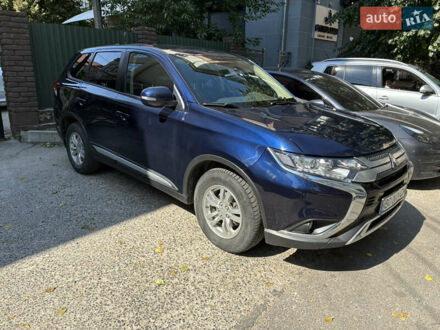 Синий Мицубиси Аутлендер, объемом двигателя 2 л и пробегом 49 тыс. км за 22000 $, фото 1 на Automoto.ua