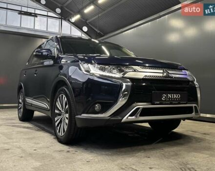 Синий Мицубиси Аутлендер, объемом двигателя 2 л и пробегом 62 тыс. км за 20500 $, фото 1 на Automoto.ua