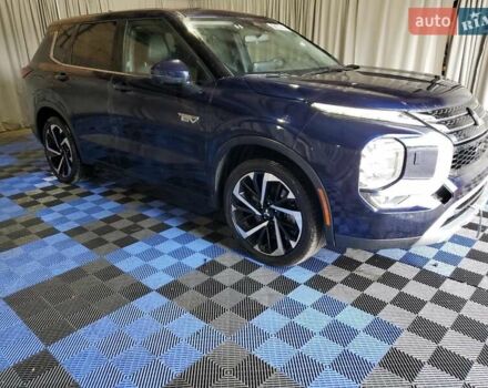 Синий Мицубиси Аутлендер, объемом двигателя 2.49 л и пробегом 88 тыс. км за 19500 $, фото 1 на Automoto.ua