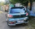 Зелений Міцубісі Аутлендер, объемом двигателя 2.4 л и пробегом 561 тыс. км за 4502 $, фото 1 на Automoto.ua