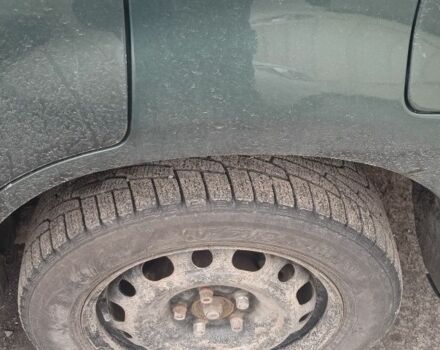 Зеленый Мицубиси Аутлендер, объемом двигателя 2 л и пробегом 220 тыс. км за 6000 $, фото 3 на Automoto.ua