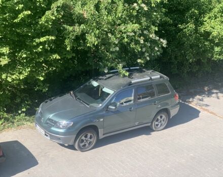 Зеленый Мицубиси Аутлендер, объемом двигателя 2 л и пробегом 220 тыс. км за 6000 $, фото 8 на Automoto.ua