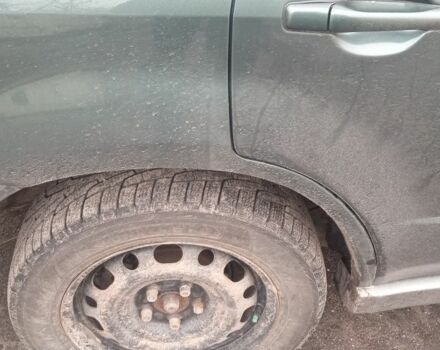 Зеленый Мицубиси Аутлендер, объемом двигателя 2 л и пробегом 220 тыс. км за 6000 $, фото 5 на Automoto.ua