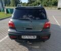 Зеленый Мицубиси Аутлендер, объемом двигателя 2 л и пробегом 173 тыс. км за 5400 $, фото 2 на Automoto.ua