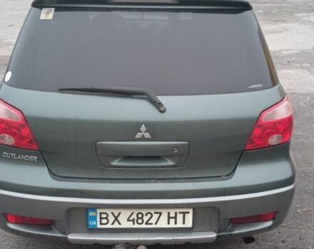 Зеленый Мицубиси Аутлендер, объемом двигателя 2 л и пробегом 220 тыс. км за 6000 $, фото 2 на Automoto.ua