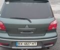Зеленый Мицубиси Аутлендер, объемом двигателя 2 л и пробегом 220 тыс. км за 6000 $, фото 2 на Automoto.ua