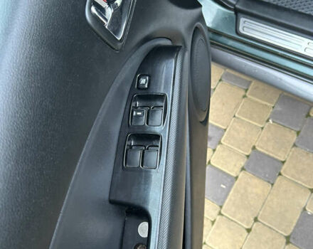 Зеленый Мицубиси Аутлендер, объемом двигателя 2.38 л и пробегом 250 тыс. км за 7200 $, фото 8 на Automoto.ua