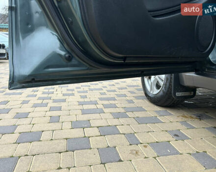 Зеленый Мицубиси Аутлендер, объемом двигателя 2.38 л и пробегом 250 тыс. км за 7200 $, фото 46 на Automoto.ua