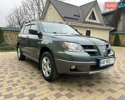 Зеленый Мицубиси Аутлендер, объемом двигателя 2.38 л и пробегом 250 тыс. км за 7200 $, фото 24 на Automoto.ua
