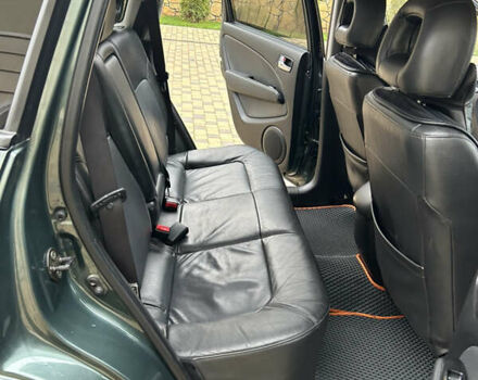 Зеленый Мицубиси Аутлендер, объемом двигателя 2.38 л и пробегом 250 тыс. км за 7200 $, фото 37 на Automoto.ua