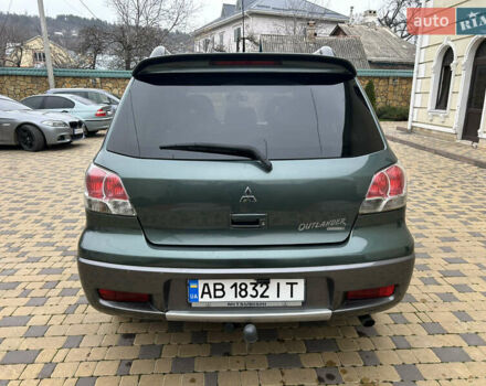 Зеленый Мицубиси Аутлендер, объемом двигателя 2.38 л и пробегом 250 тыс. км за 7200 $, фото 20 на Automoto.ua