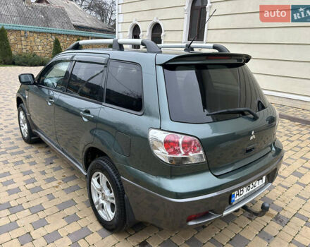 Зеленый Мицубиси Аутлендер, объемом двигателя 2.38 л и пробегом 250 тыс. км за 7200 $, фото 13 на Automoto.ua