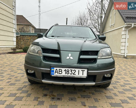 Зеленый Мицубиси Аутлендер, объемом двигателя 2.38 л и пробегом 250 тыс. км за 7200 $, фото 25 на Automoto.ua