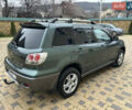 Зеленый Мицубиси Аутлендер, объемом двигателя 2.38 л и пробегом 250 тыс. км за 7200 $, фото 14 на Automoto.ua