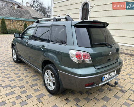 Зеленый Мицубиси Аутлендер, объемом двигателя 2.38 л и пробегом 250 тыс. км за 7200 $, фото 21 на Automoto.ua