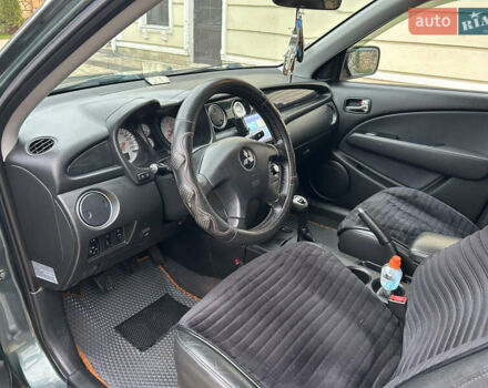 Зеленый Мицубиси Аутлендер, объемом двигателя 2.38 л и пробегом 250 тыс. км за 7200 $, фото 5 на Automoto.ua