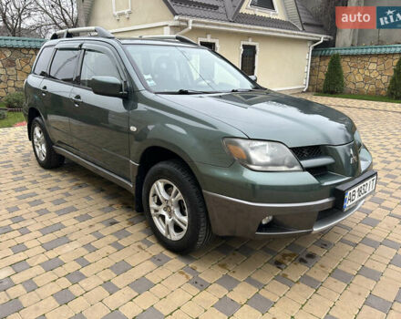 Зеленый Мицубиси Аутлендер, объемом двигателя 2.38 л и пробегом 250 тыс. км за 7200 $, фото 4 на Automoto.ua