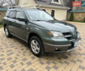 Зеленый Мицубиси Аутлендер, объемом двигателя 2.38 л и пробегом 250 тыс. км за 7200 $, фото 4 на Automoto.ua