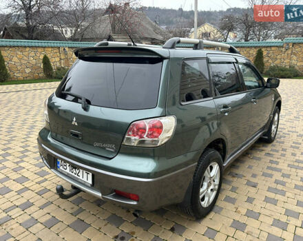 Зеленый Мицубиси Аутлендер, объемом двигателя 2.38 л и пробегом 250 тыс. км за 7200 $, фото 19 на Automoto.ua