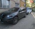 Зеленый Мицубиси Аутлендер, объемом двигателя 2.38 л и пробегом 247 тыс. км за 7000 $, фото 4 на Automoto.ua