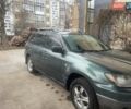 Зелений Міцубісі Аутлендер, об'ємом двигуна 2.4 л та пробігом 300 тис. км за 5000 $, фото 3 на Automoto.ua