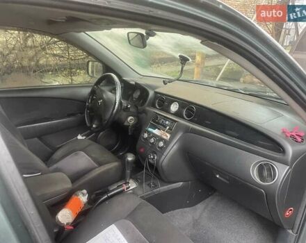 Зелений Міцубісі Аутлендер, об'ємом двигуна 2.4 л та пробігом 300 тис. км за 5000 $, фото 2 на Automoto.ua