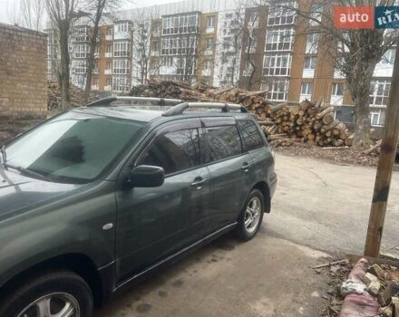 Зелений Міцубісі Аутлендер, об'ємом двигуна 2.4 л та пробігом 300 тис. км за 5000 $, фото 5 на Automoto.ua