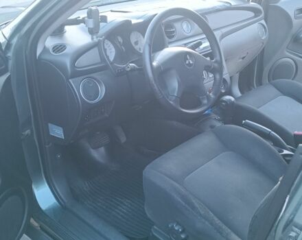 Зеленый Мицубиси Аутлендер, объемом двигателя 3 л и пробегом 220 тыс. км за 4000 $, фото 6 на Automoto.ua