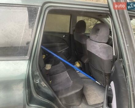 Зелений Міцубісі Аутлендер, об'ємом двигуна 2.4 л та пробігом 300 тис. км за 5000 $, фото 1 на Automoto.ua