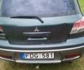 Зеленый Мицубиси Аутлендер, объемом двигателя 2.4 л и пробегом 220 тыс. км за 4000 $, фото 1 на Automoto.ua
