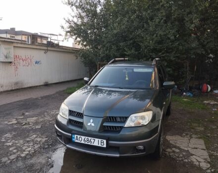 Зелений Міцубісі Аутлендер, об'ємом двигуна 2.4 л та пробігом 3 тис. км за 6500 $, фото 2 на Automoto.ua