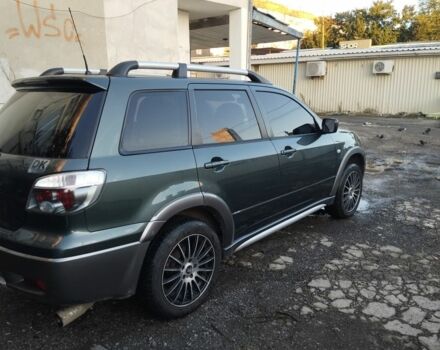 Зелений Міцубісі Аутлендер, об'ємом двигуна 2.4 л та пробігом 3 тис. км за 6500 $, фото 3 на Automoto.ua