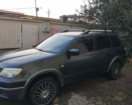 Зелений Міцубісі Аутлендер, об'ємом двигуна 2.4 л та пробігом 3 тис. км за 6500 $, фото 1 на Automoto.ua