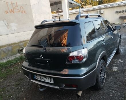 Зелений Міцубісі Аутлендер, об'ємом двигуна 2.4 л та пробігом 3 тис. км за 6500 $, фото 4 на Automoto.ua