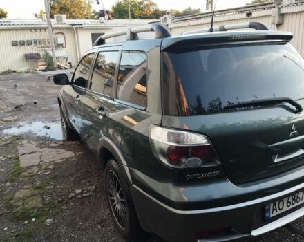 Зелений Міцубісі Аутлендер, об'ємом двигуна 2.4 л та пробігом 3 тис. км за 6500 $, фото 5 на Automoto.ua