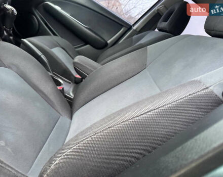 Зеленый Мицубиси Аутлендер, объемом двигателя 2 л и пробегом 194 тыс. км за 6350 $, фото 22 на Automoto.ua