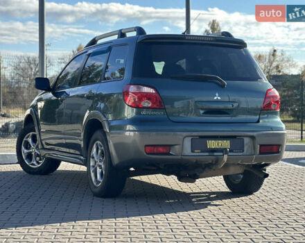 Міцубісі Аутлендер 2006 у Києві на Automoto.ua Зелений Міцубісі Аутлендер, об'ємом двигуна 2.4 л та пробігом 275 тис. км за 7350 $, фото 20 на Automoto.ua