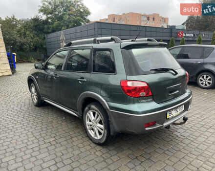 Зеленый Мицубиси Аутлендер, объемом двигателя 2.38 л и пробегом 213 тыс. км за 5999 $, фото 3 на Automoto.ua