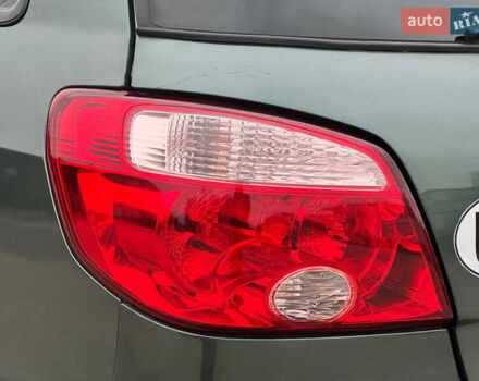 Зеленый Мицубиси Аутлендер, объемом двигателя 2 л и пробегом 194 тыс. км за 6350 $, фото 13 на Automoto.ua