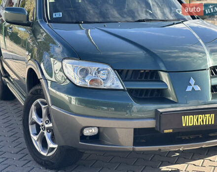 Міцубісі Аутлендер 2006 у Києві на Automoto.ua Зелений Міцубісі Аутлендер, об'ємом двигуна 2.4 л та пробігом 275 тис. км за 7350 $, фото 7 на Automoto.ua